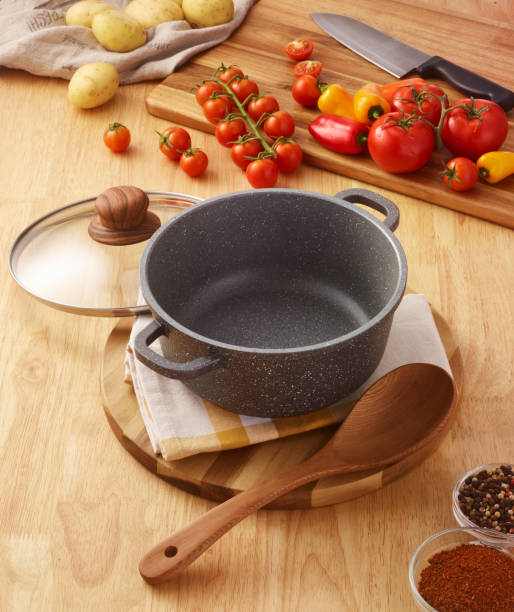 istock empty saucepan or cooking pot on the wooden background 1184367398