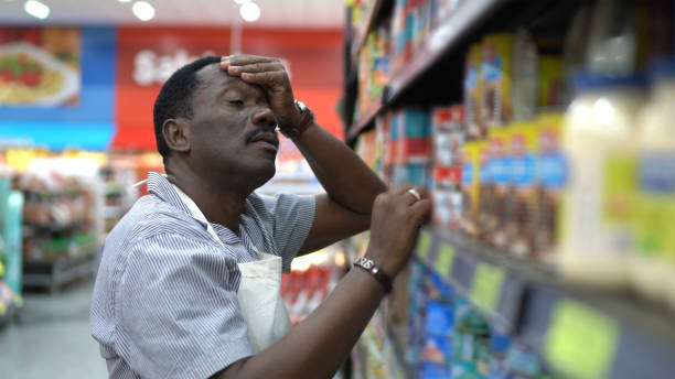 istock Employee or owner feeling bad at supermarket 1184370336