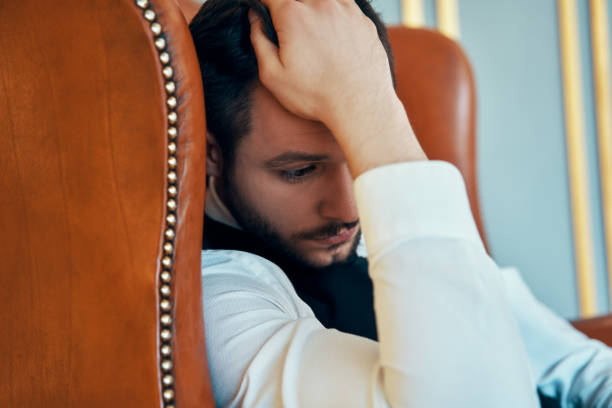 istock Portrait of stressed despair young man 1184370864
