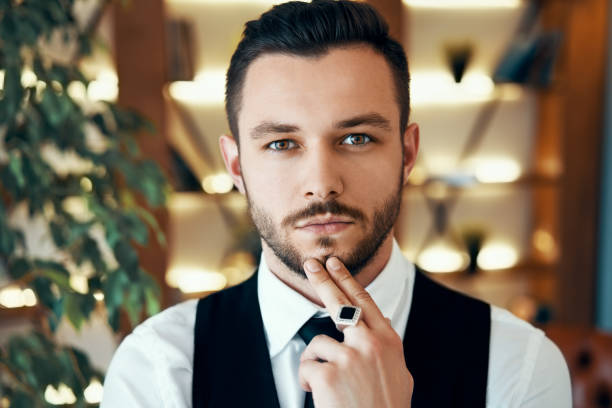 istock Thoughtful handsome beautiful man portrait 1184370882