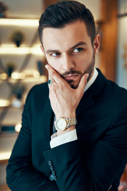istock Thoughtful handsome beautiful man portrait 1184370890