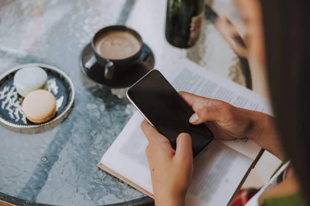 istock Young woman is typing om mobile phone 1184371426