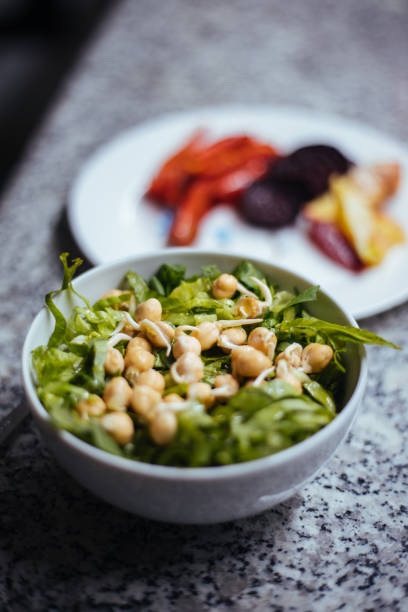 istock A bowl of salad with sprouts chickpeas 1184372691