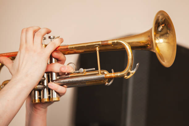 istock Trumpet in trumpeter hands 1184373183