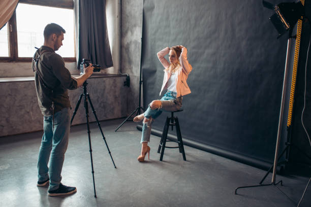 istock confident hipster showing her cool clothes and hairstyle 1184374853
