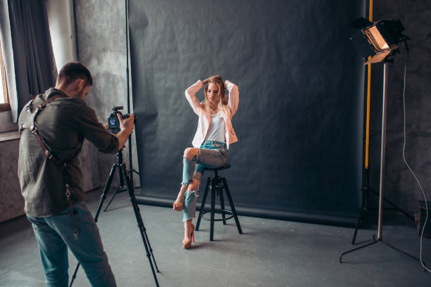 istock young man trying to make a good photo 1184374871
