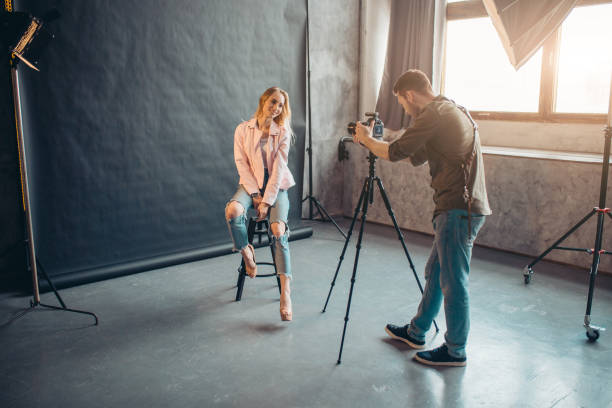 istock young beautiful woman has won the photo session 1184374970