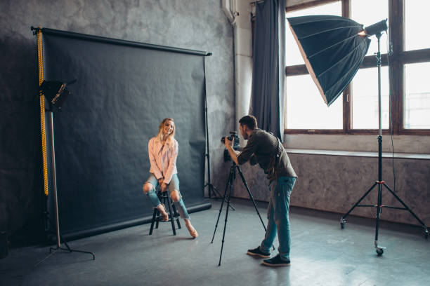 istock young man learning to take a picture 1184375156