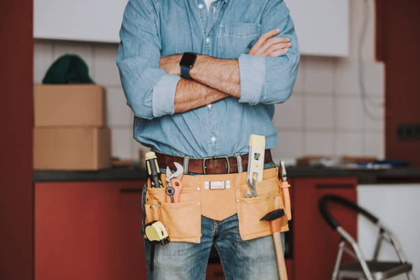 istock Man is wearing tool belt in the kitchen 1184378648