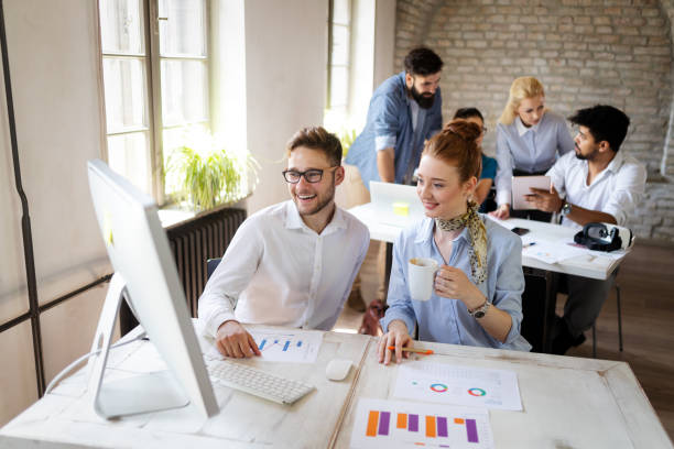 istock Successful business group of people at work in office 1184378991