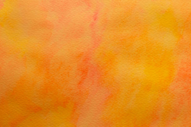 istock Bright orange background. Creative template with mixing gradient. Paper canvas with yellow ink. Watercolor texture, aquarelle pattern. 1184380500