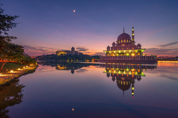 istock Floating mosque during blue hour and sunrise 1184381907