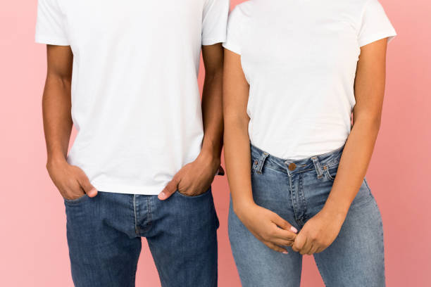 istock Guy holding hands in pockets, girl joined hands together 1184382985