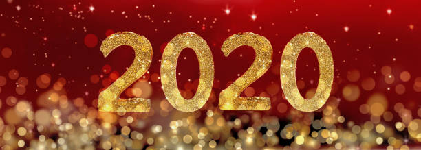 istock 2020 new year golden figures on blur lights and red background 1184384527