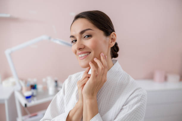istock Charming young woman looking at camera and smiling 1184388994