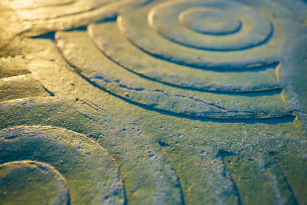 Close-up of green marble stone footpath with sunlight