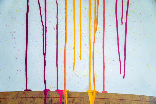 vibrant acrylic color vertical stripes with scratched on concrete wall surface, abstract graffiti background