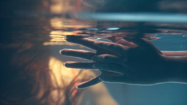 istock Shy, sensual touch. Underwater romance 1184389548