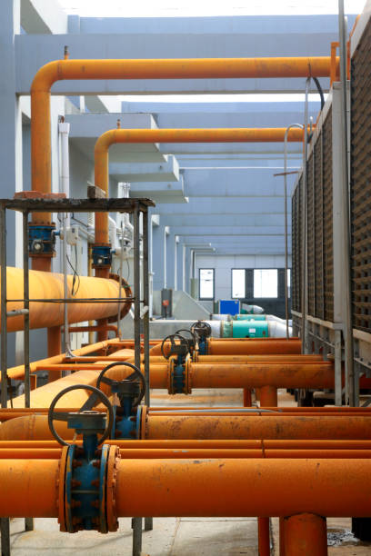 istock Metal pipe vent in an old factory 1184389631