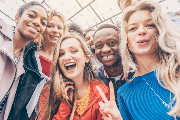 istock Friends of different ethnicities looking into the camera 1184393312