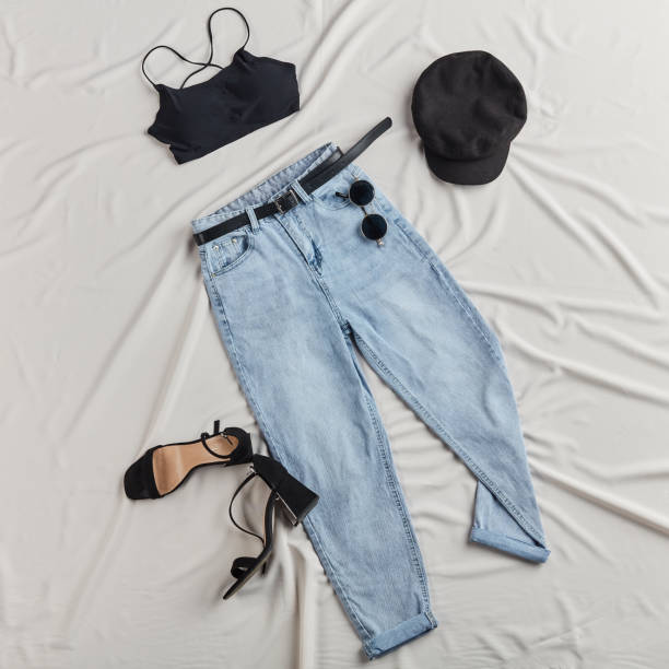 istock woman selling her clothes in the internet . second hand 1184393475