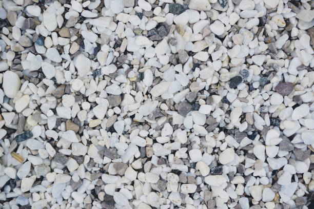 istock white and gray decorative pebbles for landscape design 1184394735