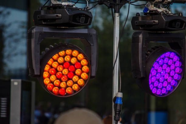istock LED lighting device with a rotating head (Moving Head Wash) for lighting the stage during the concert. Close-up. 1184394781