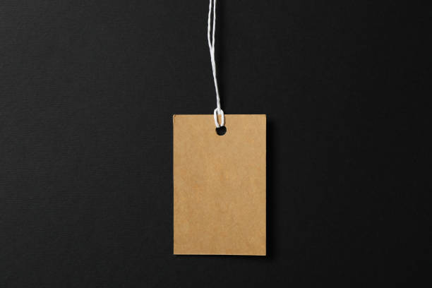 istock Price tag on black background, space for text. Black Friday sale 1184401553