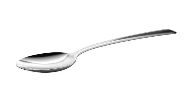 Photo of Silver spoon isolated on white background.