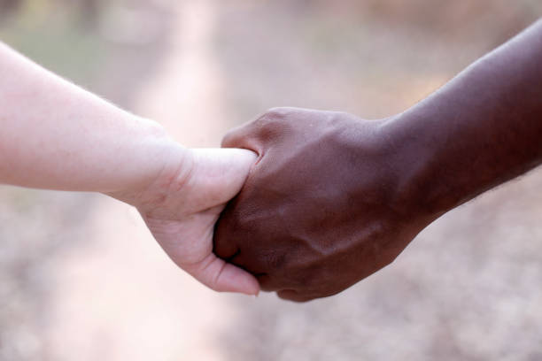 istock United hands and wedding rings 1184405225