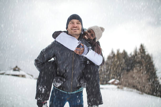 enjoying their winter vacation - skiing winter women snow imagens e fotografias de stock