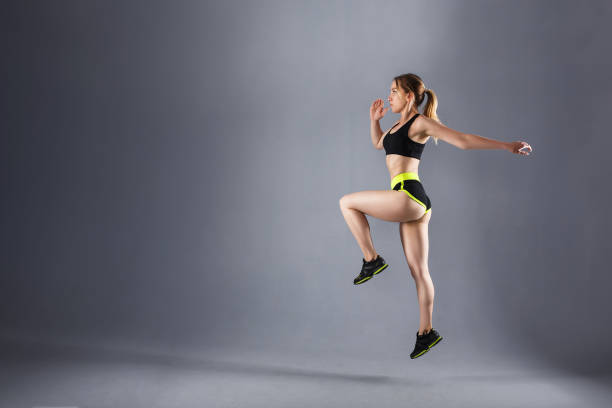 istock Beautiful young athlete in a sport suit 1184408185