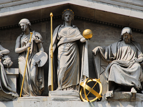 London, England, UK: British Museum south facade - central part of the pediment representing the progress of civilisation, designed by Sir Richard Westmacott (1850) - figures representing painting, science and geometry.