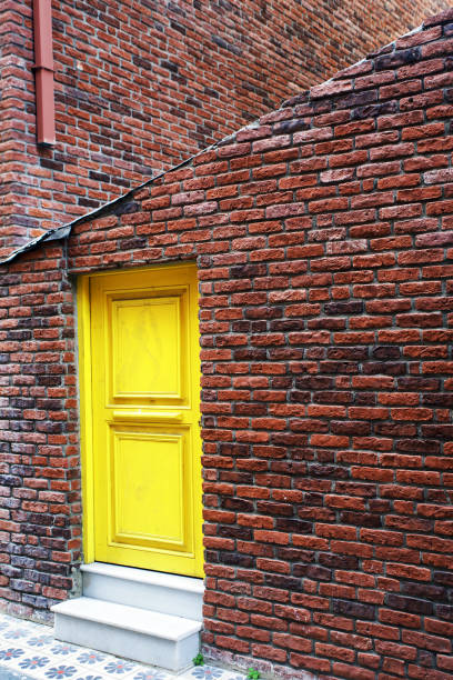 istock back door and red brick wall 1184410867