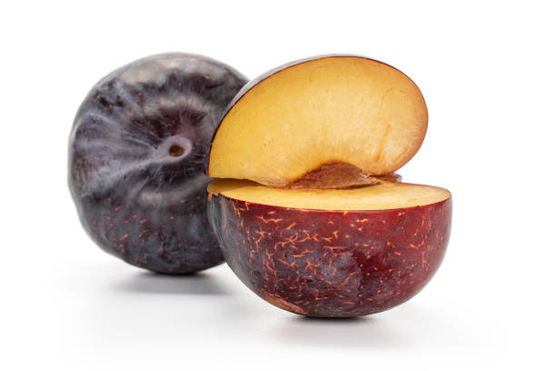 istock Fresh red plum isolated on white 1184411313