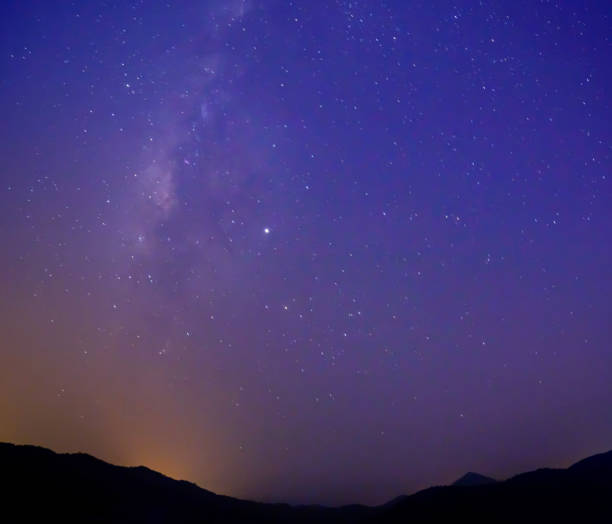 istock Milky Way at night sky with stars. 1184412372