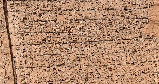 istock Background of ancient Egyptian hieroglyphs 1184413009