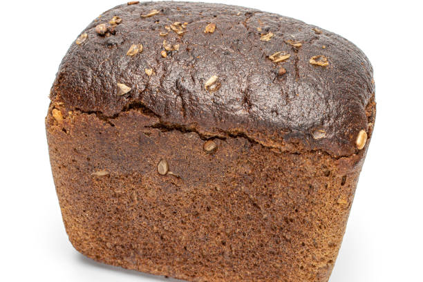istock Fresh baked dark bread isolated on white 1184413123