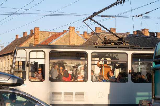 Cluj Napoca, Romania - 23 Oct, 2019: Commuters traveling on a tram n Cluj Napoca, Romania.