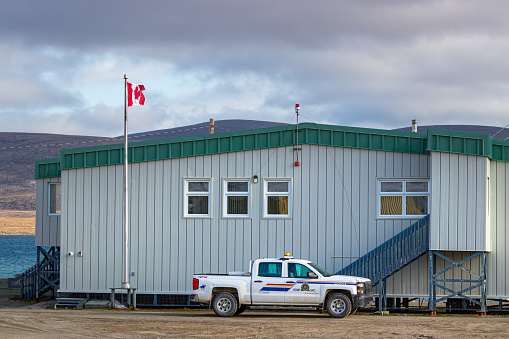 Clyde River, Baffin Island, Canada - August 20th, 2019: The Canadian Police Station at the port in Clyde River, Nunavut, Canada.