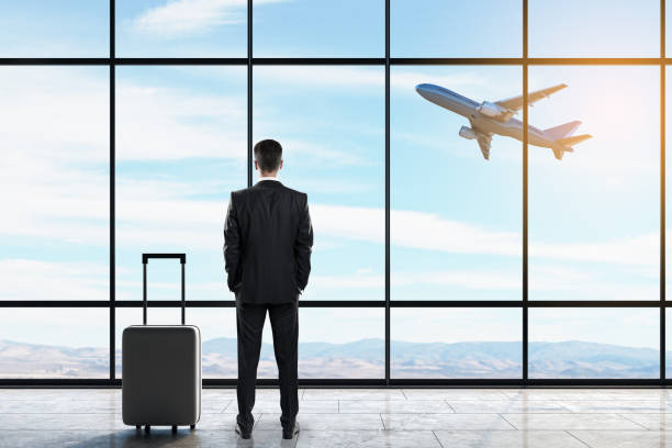 istock Businessman in airport 1184415567