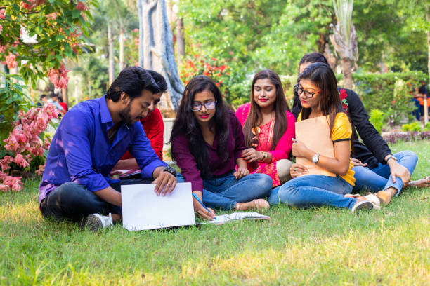 istock Group of College Student studying in a city park 1184416056