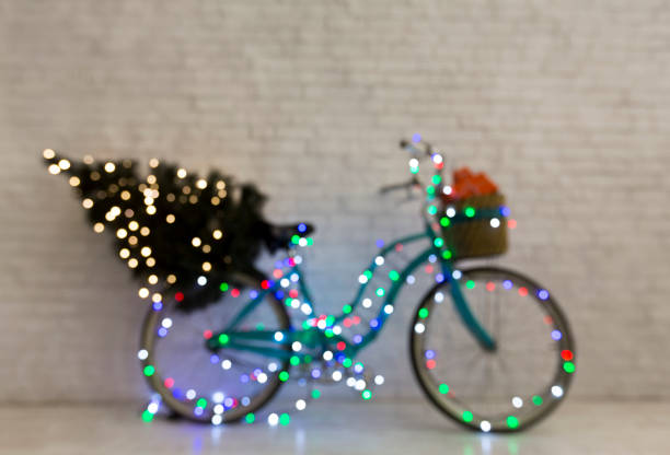istock Creative Christmas blue bicycle with pine tree and gifts 1184416271