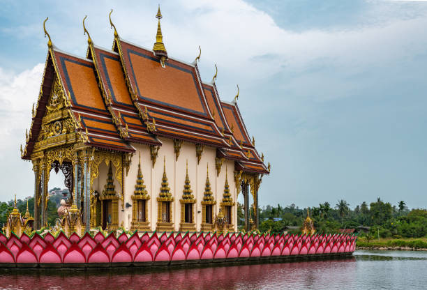Wat Plai Laem Temple Exterior at Koh Samiu at sunset