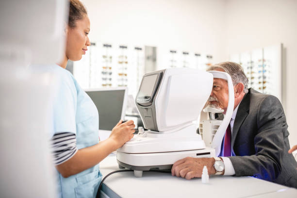 istock Senior man getting an eye exam at a clinic 1184420045
