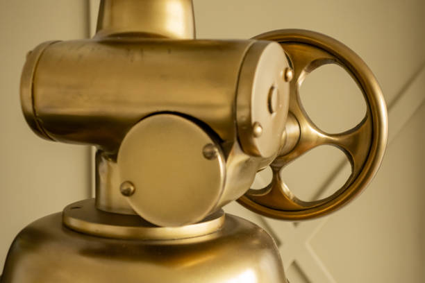 istock Brass assembly from a vintage lantern with adjustable wheel. Creative element of the loft interior. 1184420079