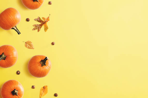 istock Autumn pumpkins with leaves 1184421512