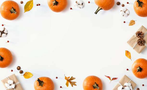 istock Autumn theme with orange pumpkins 1184421531