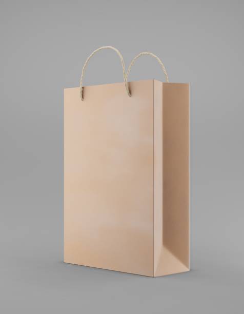 istock Eco packaging mockup bag kraft paper with handle half side. Standard medium brown template on gray background promotional advertising. 3D rendering 1184421758