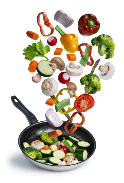istock grilled fresh vegetables flying isolated on blue background 1184422571